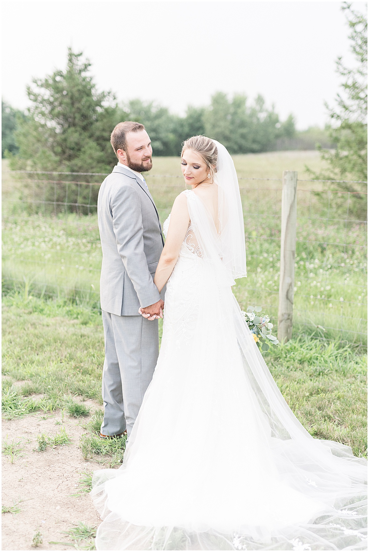 Bride and groom after Gathering Acres wedding in Lafayette, Indiana photographed by Lafayette, Indiana wedding photographer Victoria Rayburn