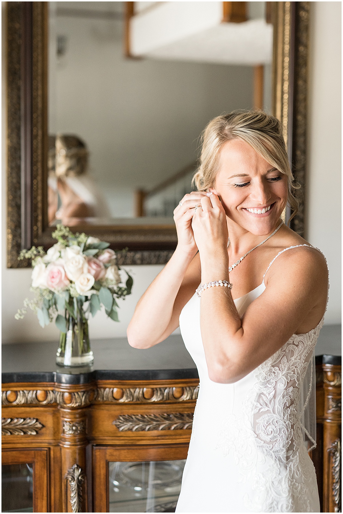 Bride getting ready for wedding at The Edge in Anderson, Indiana photographed by Indianapolis wedding photographer Victoria Rayburn