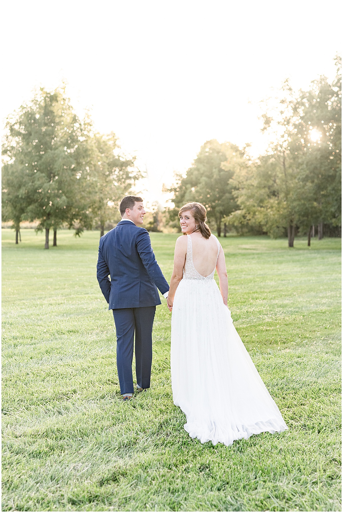 Sunset photos after wedding at The Sixpence in Whitestown, Indiana photographed by Indianapolis wedding photographer Victoria Rayburn