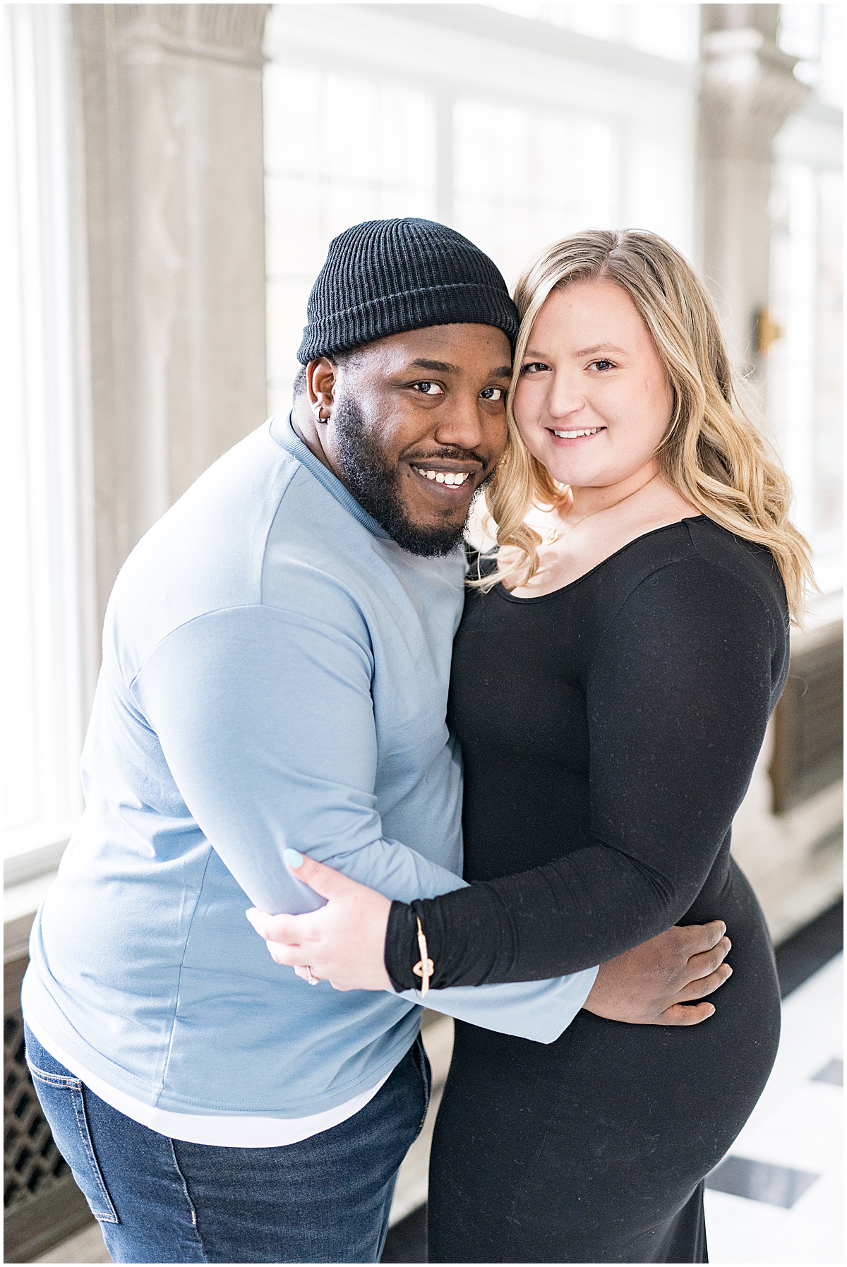 Winter Laurel Hall engagement photos in Laurel Hall’s solarium by Indianapolis wedding photographer Victoria Rayburn Photography