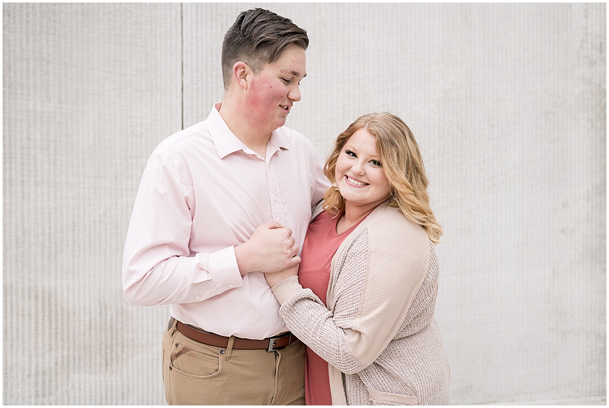 March engagement photos in Downtown Indianapolis by the Soldiers and Sailors Monument