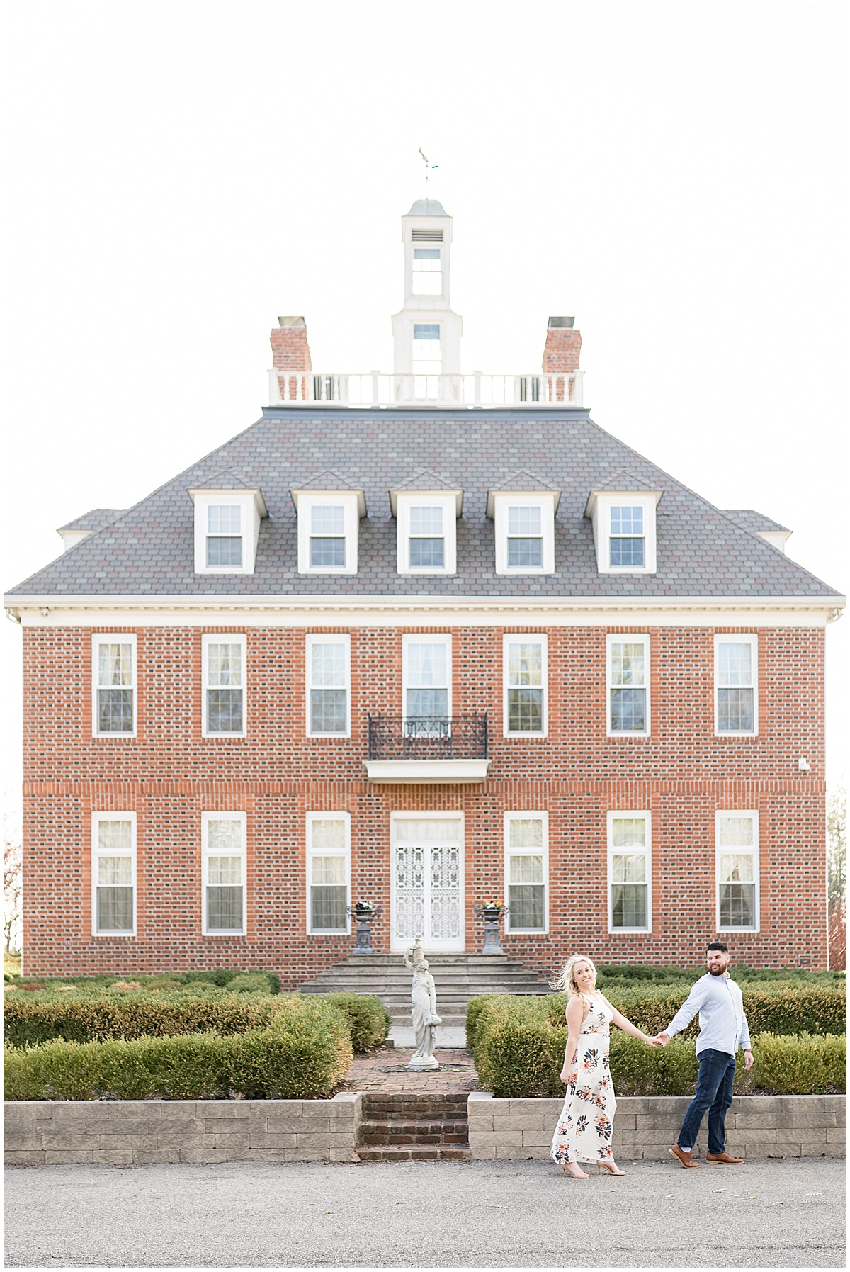 Spring engagement photos in front of Coxhall Mansion in Carmel, Indiana