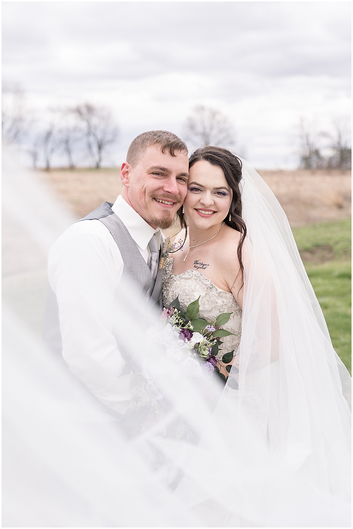 Bride and groom at wedding at Finkbiner Gala Barn in Veedersburg, Indiana