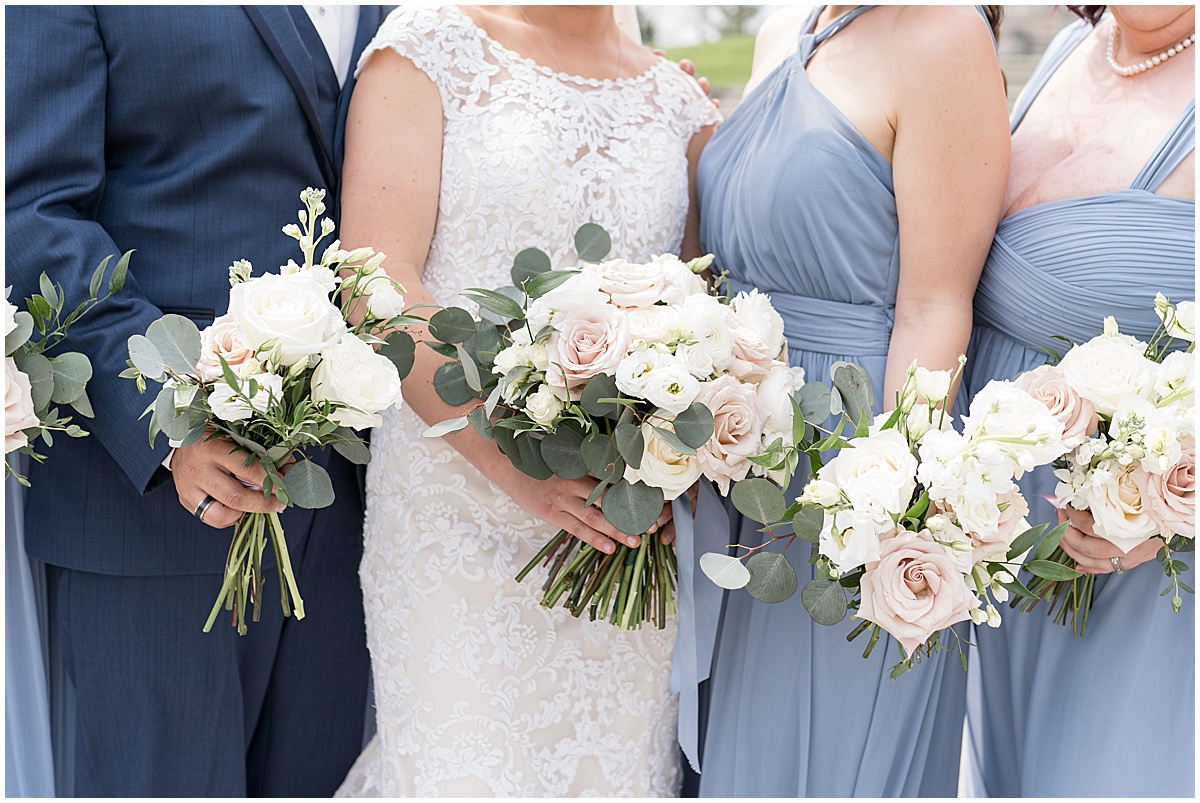 Bouquet details at bridal party photos at Coxhall Gardens in Carmel, Indiana