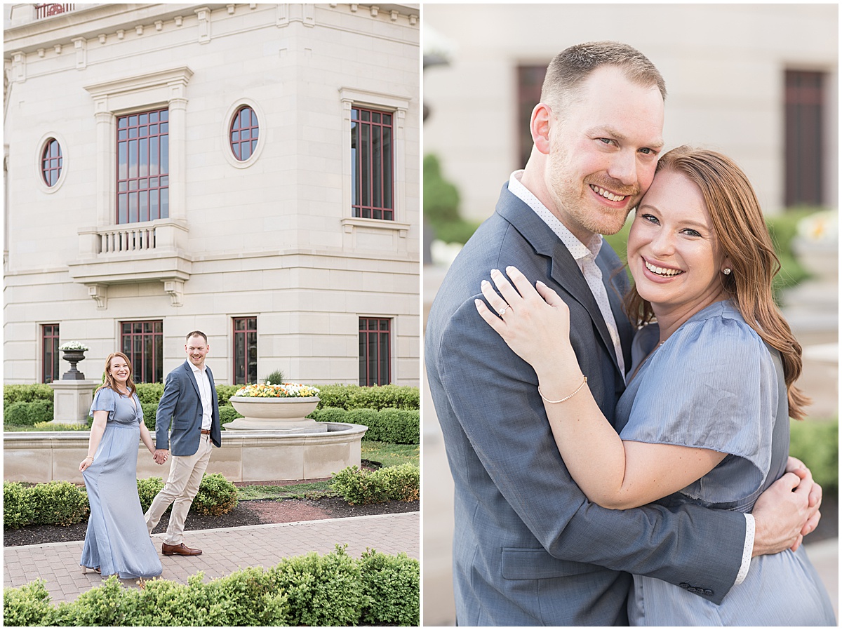 Couple walk on path during engagement photos at The Palladium in Carmel, Indiana