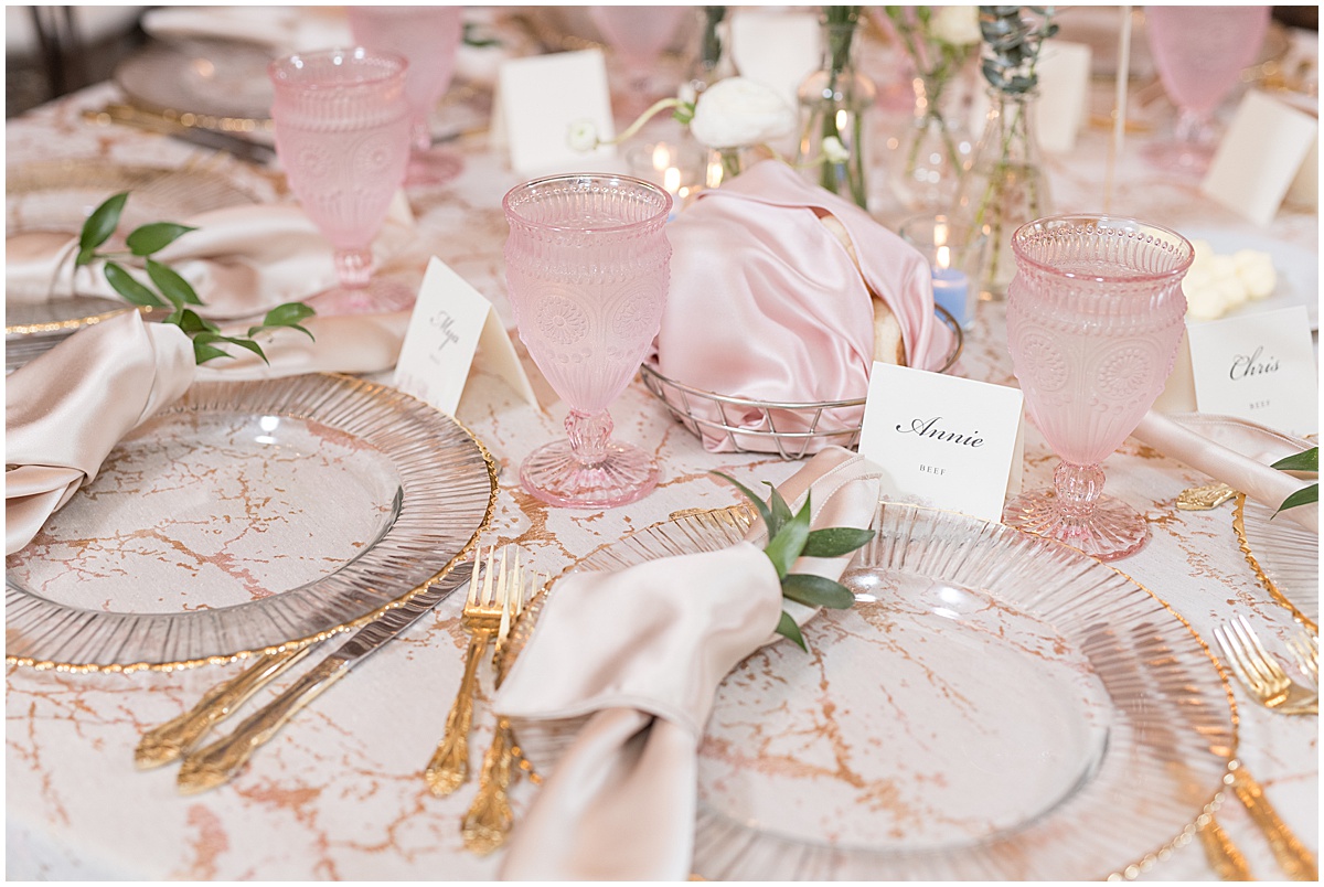 Table details with pink and gold accents at Finley Creek Vineyards wedding in Zionsville, Indiana