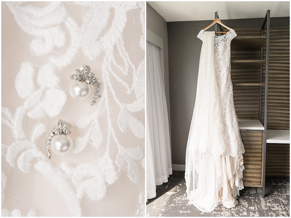 Bridal gown and earrings hanging for bride to get ready at Marriott North Indianapolis