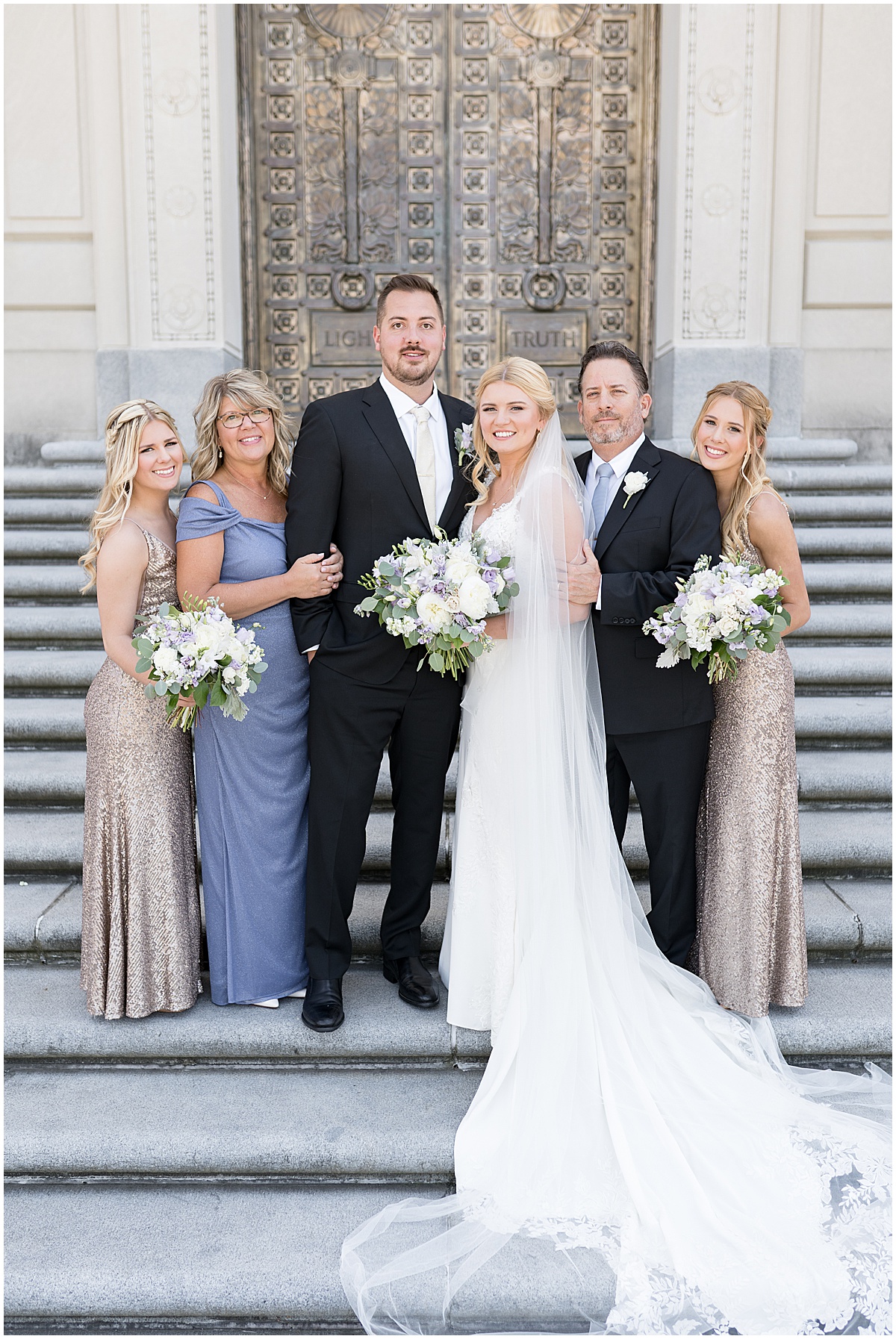 Family wedding photo at The Indiana World War Memorial in downtown Indianapolis