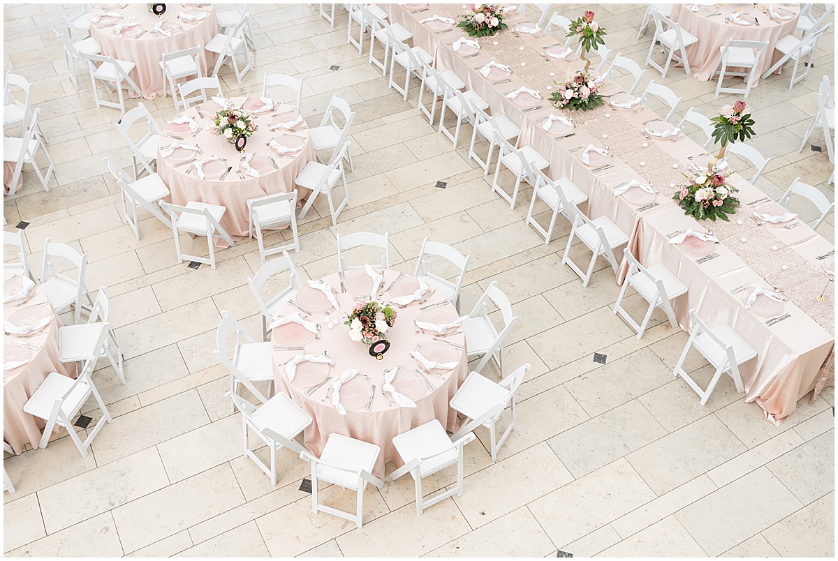 Pink and white table setting for Indianapolis Artsgarden wedding reception