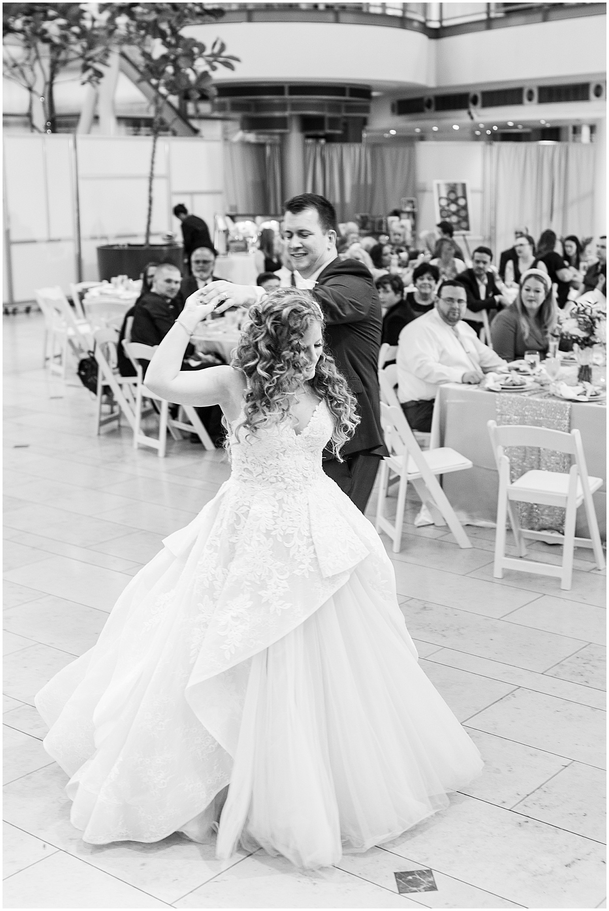 Bride and groom dance at Indianapolis Artsgarden wedding reception