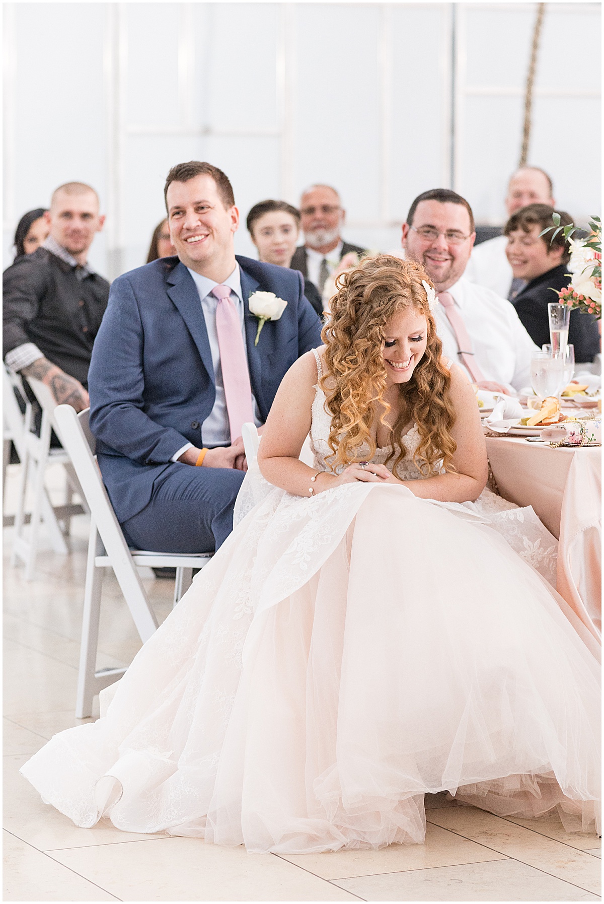 Bride and groom laughing at Indianapolis Artsgarden wedding reception