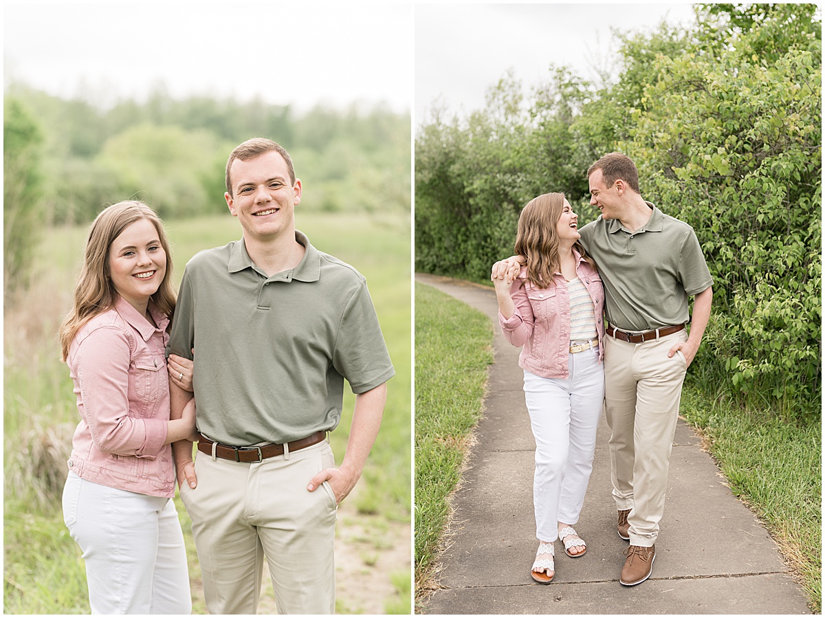 Couple walking during engagement photos at Fairfield Lakes Park in Lafayette, Indiana