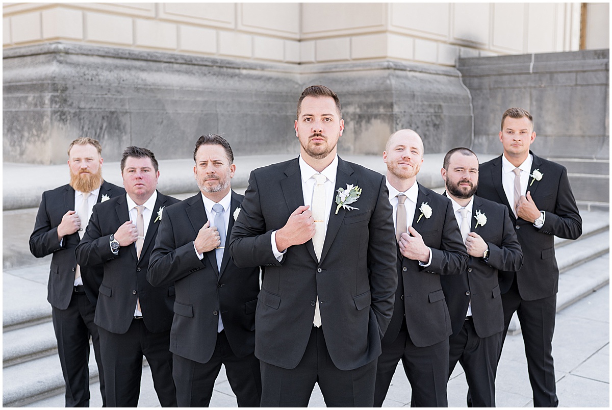 Groom with groomsmen at The Indiana War Memorial in downtown Indianapolis.