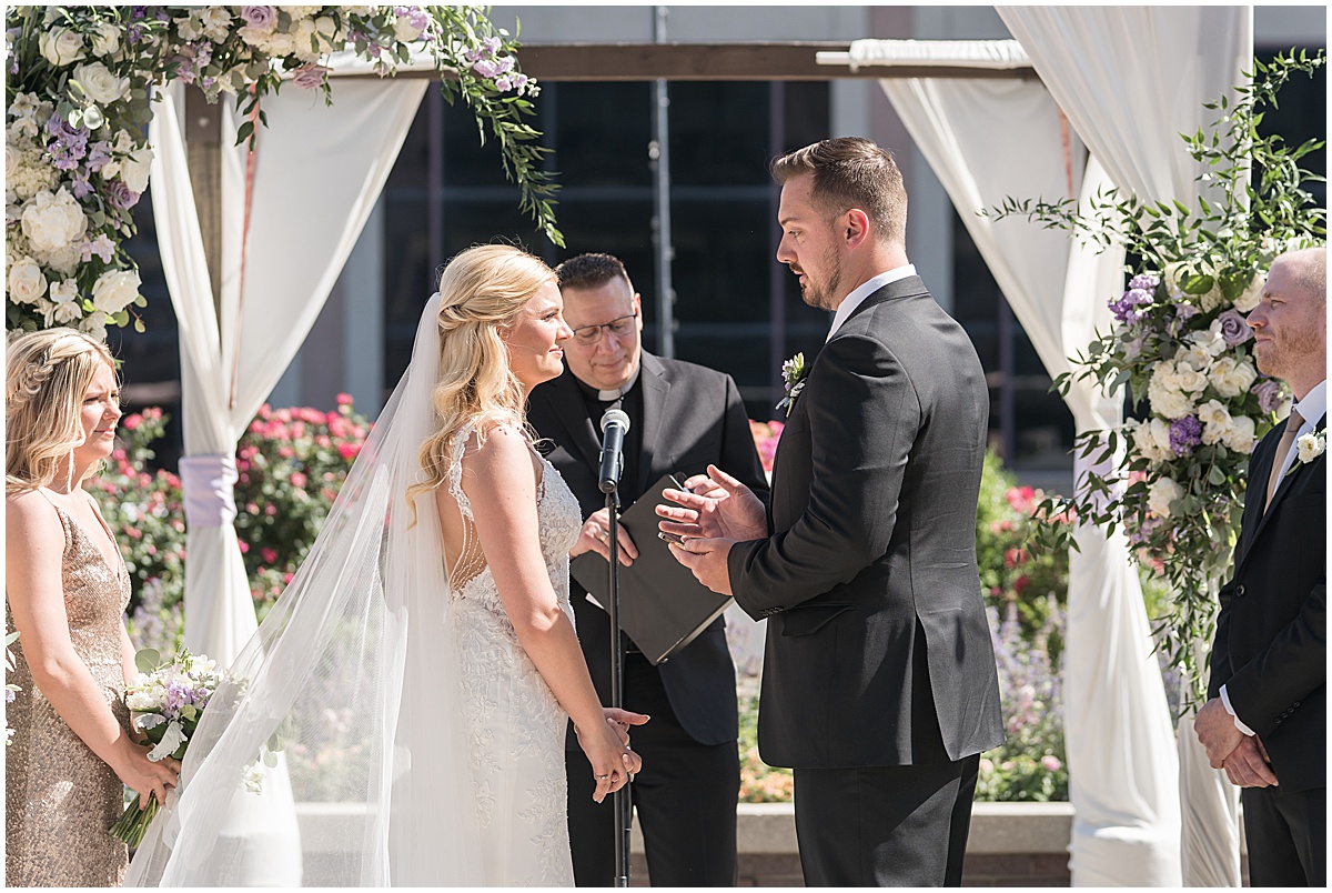 Bride and groom exchange vows at rooftop wedding in downtown Indianapolis at JPS Events