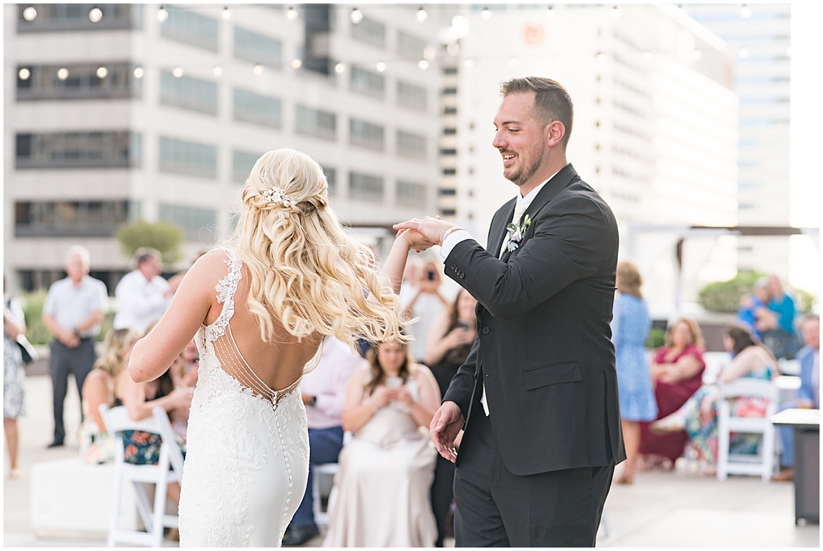 Bride and groom dance at rooftop wedding in downtown Indianapolis at JPS Events
