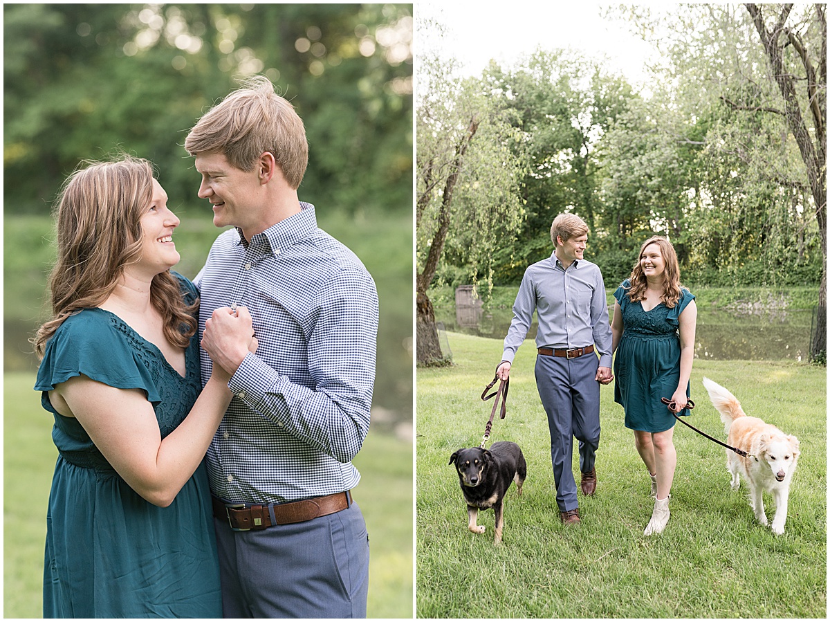 Couple holding hands while walking dogs at spring engagement photos at Holcomb Gardens in Indianapolis