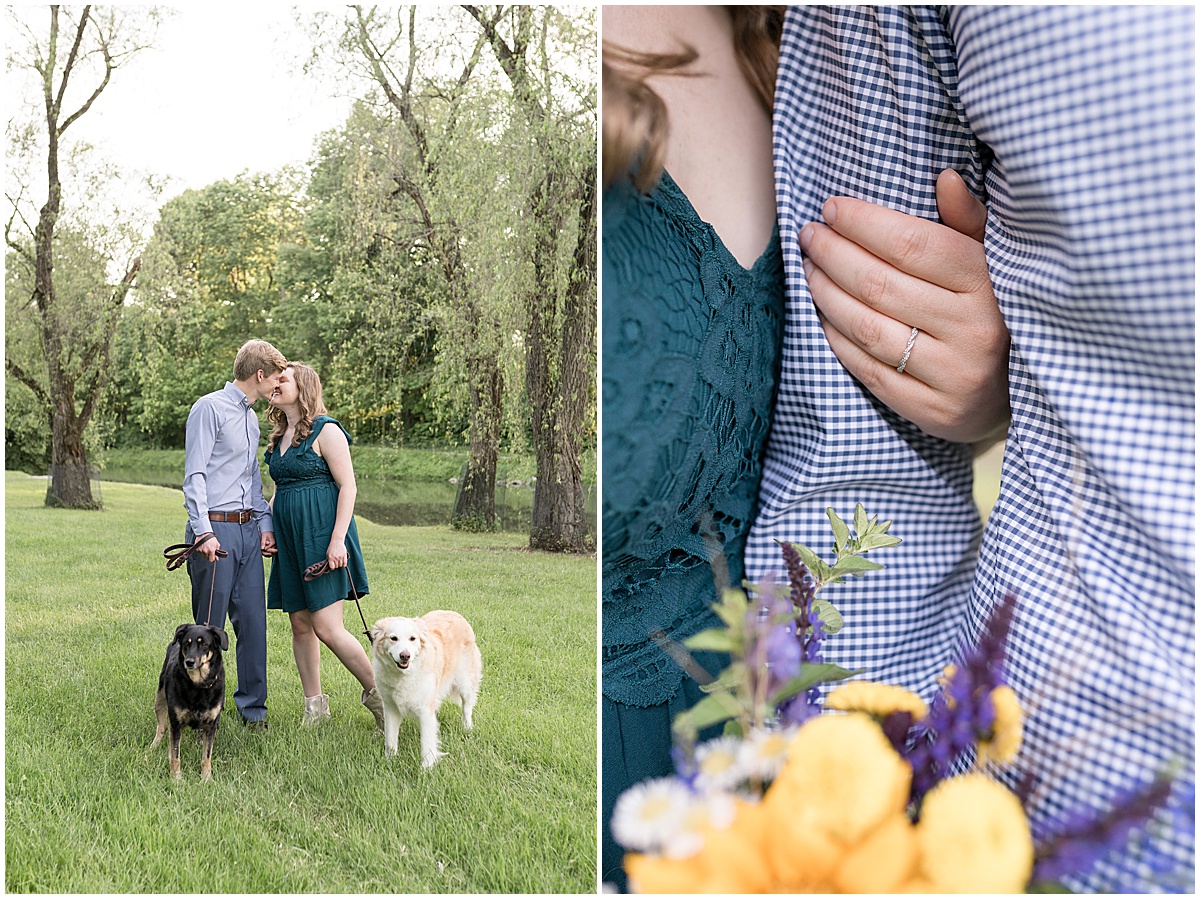 Couple kissing with dogs at spring engagement photos at Holcomb Gardens in Indianapolis