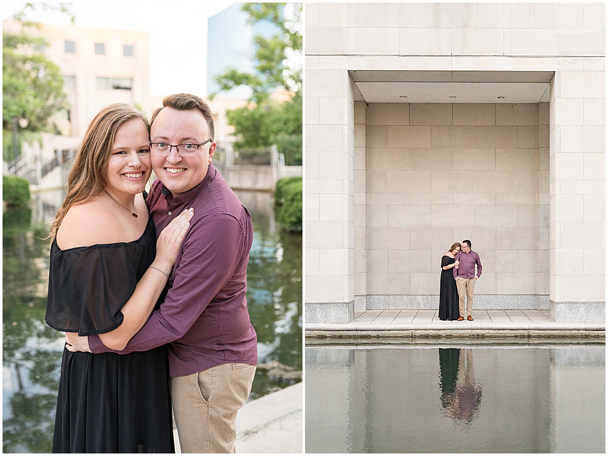 Couple hugging at downtown Indianapolis Canal Walk engagement photos.