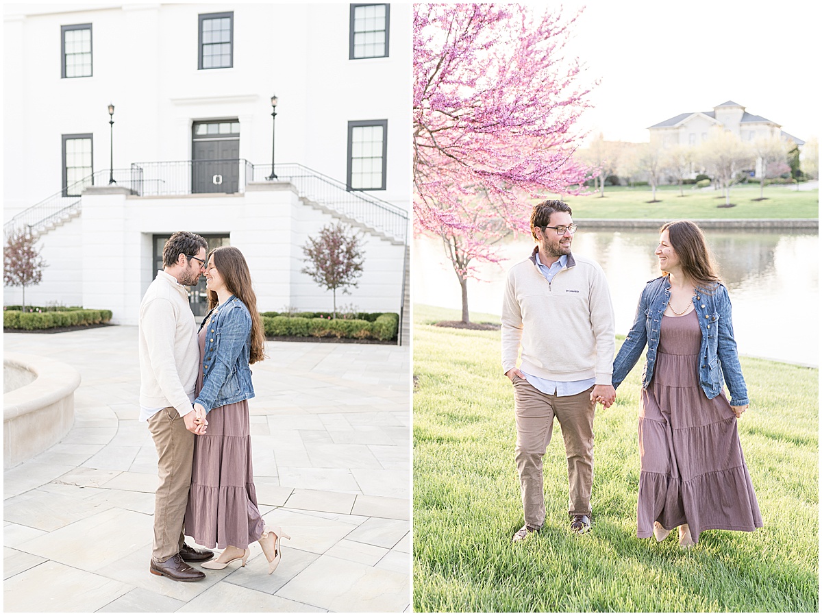 Couple holding hands during engagement photos in The Village of WestClay in Carmel, Indiana by Indianapolis wedding photographer Victoria Rayburn Photography.