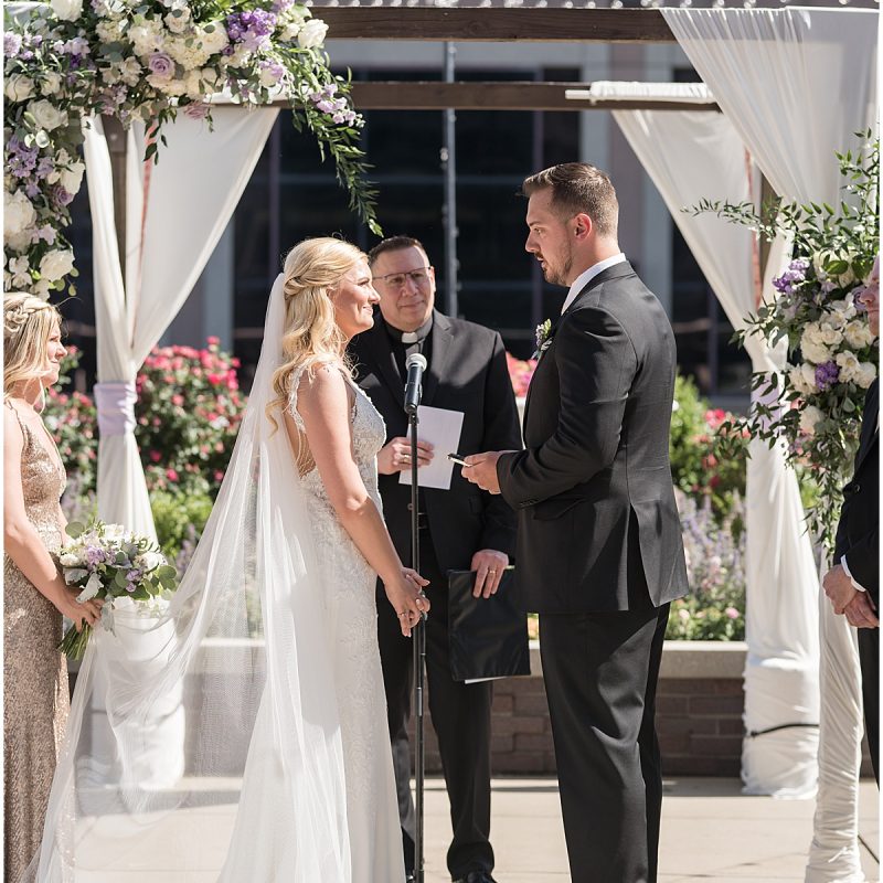 Bride and groom exchange vows during JPS Events Wedding in Downtown Indianapolis