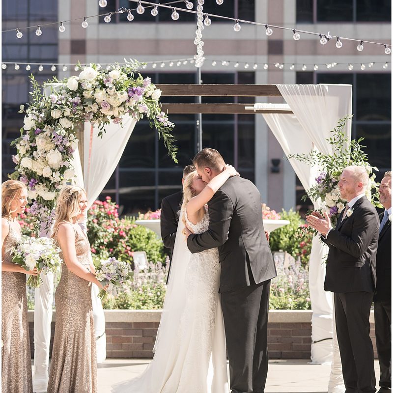 Bride and groom kiss at JPS Events Wedding in Downtown Indianapolis