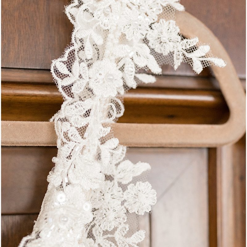 Detail of floral lace on wedding dress for JPS Events wedding in downtown Indianapolis