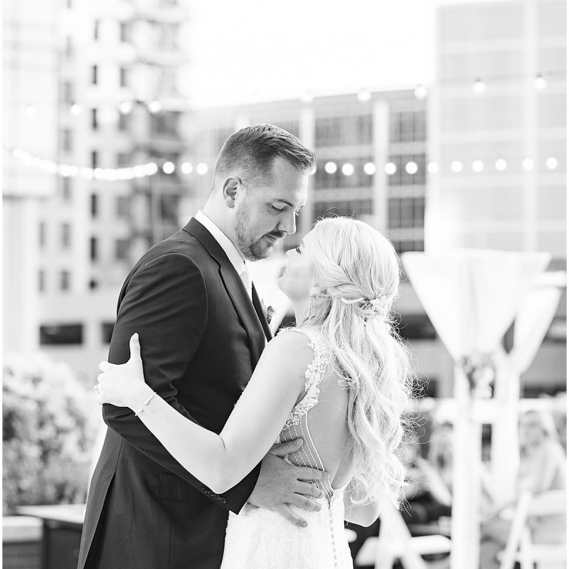 Bride and groom dance on rooftop of JPS Events Wedding Reception in Downtown Indianapolis