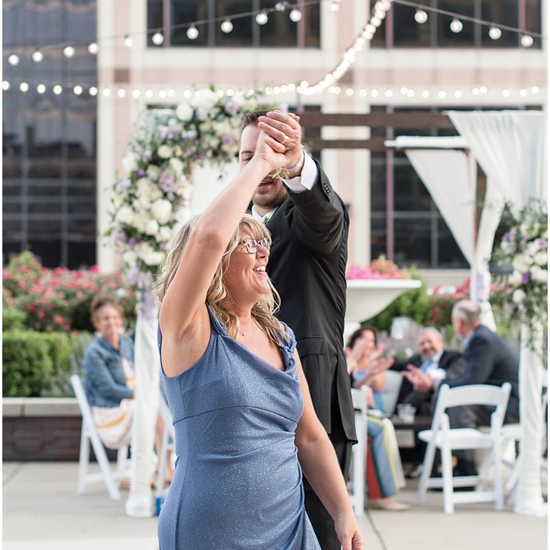 Groom dances with mother at JPS Events Wedding Reception in Downtown Indianapolis