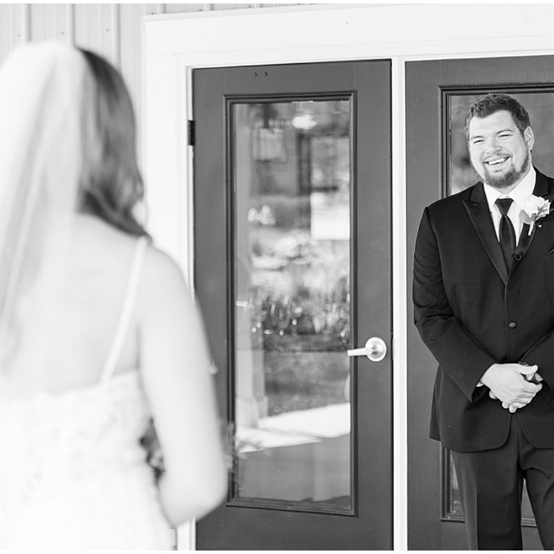 Grooms reaction to first look outside of New Journey Farms