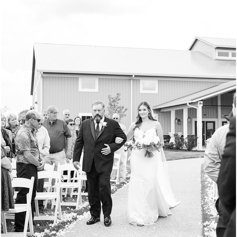 Bride walking down the aisle at New Journey Farms Wedding