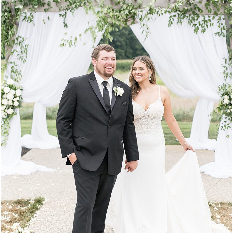 Bride and groom walk down aisle at New Journey Farms