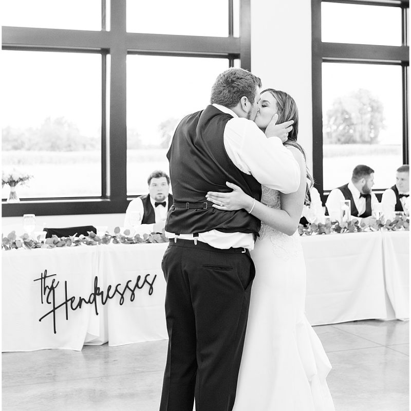 Bride and groom kiss during dance at New Journey Farms