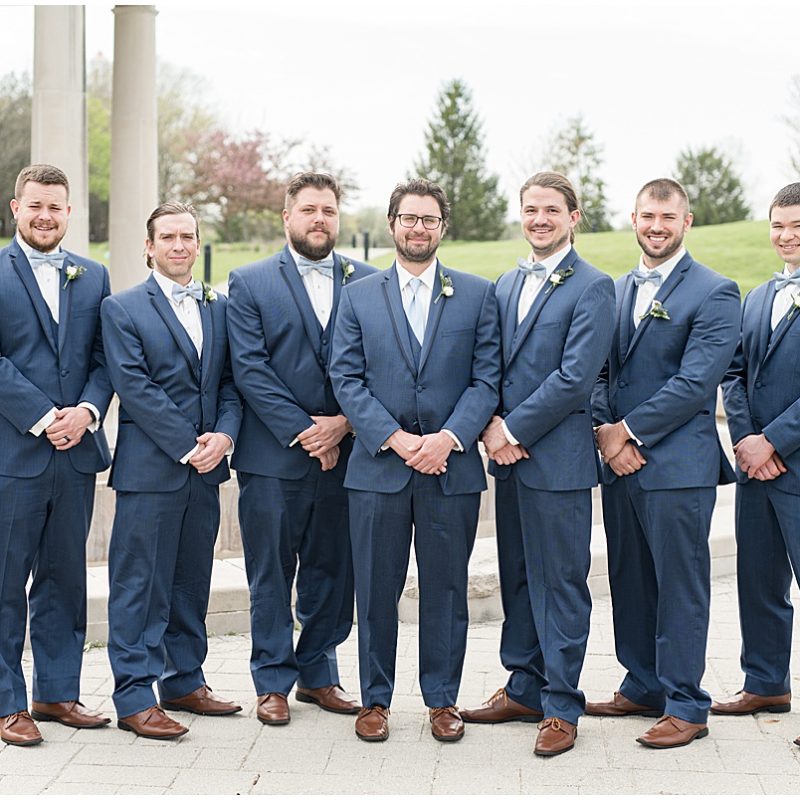 Groom with groomsmen at wedding photos at Coxhall Gardens