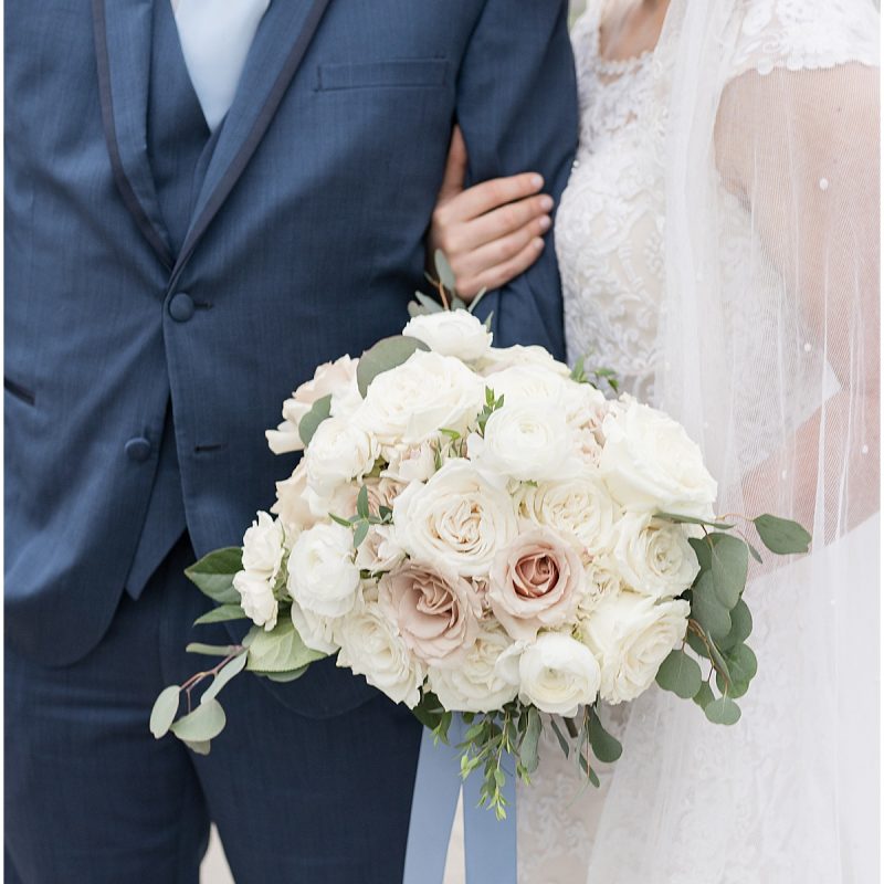 Bouquet details at wedding photos at Coxhall Gardens