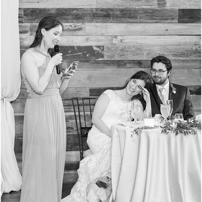 Bride and groom react to speeches at Finley Creek Vineyards