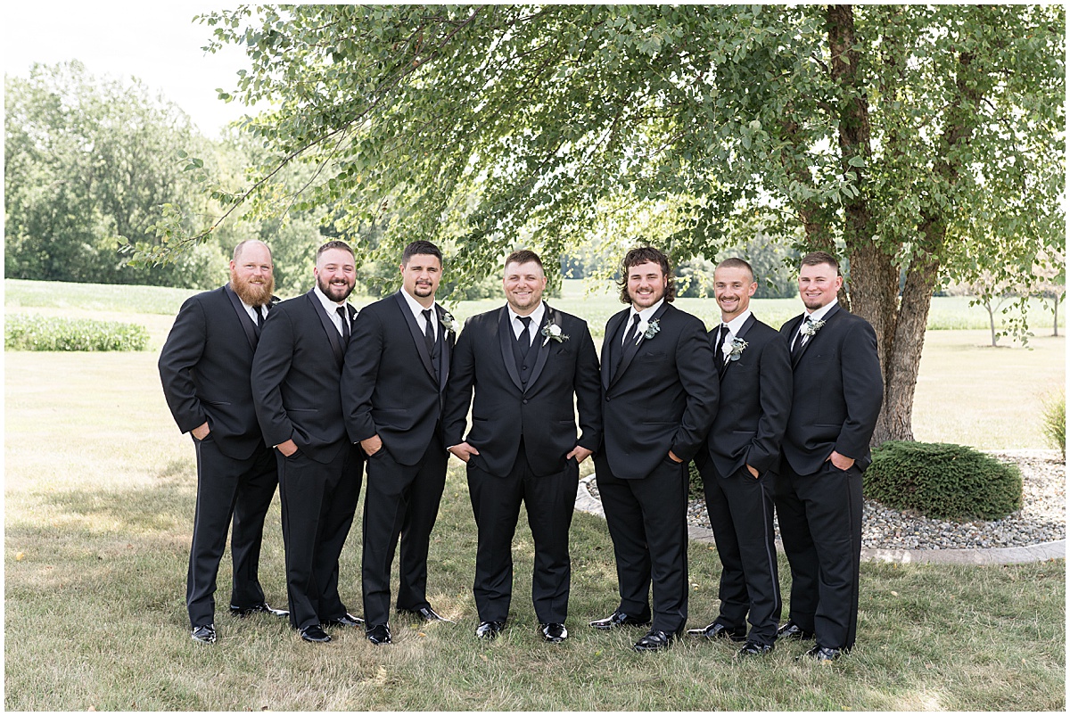 Groomsmen in black tuxedos for wedding in Converse, Indiana
