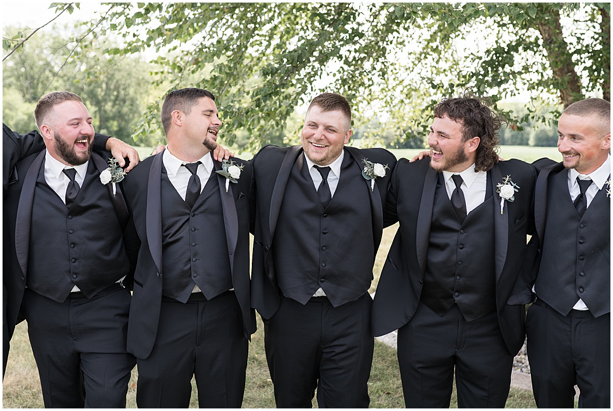 Groomsmen walking together at wedding in Converse, Indiana
