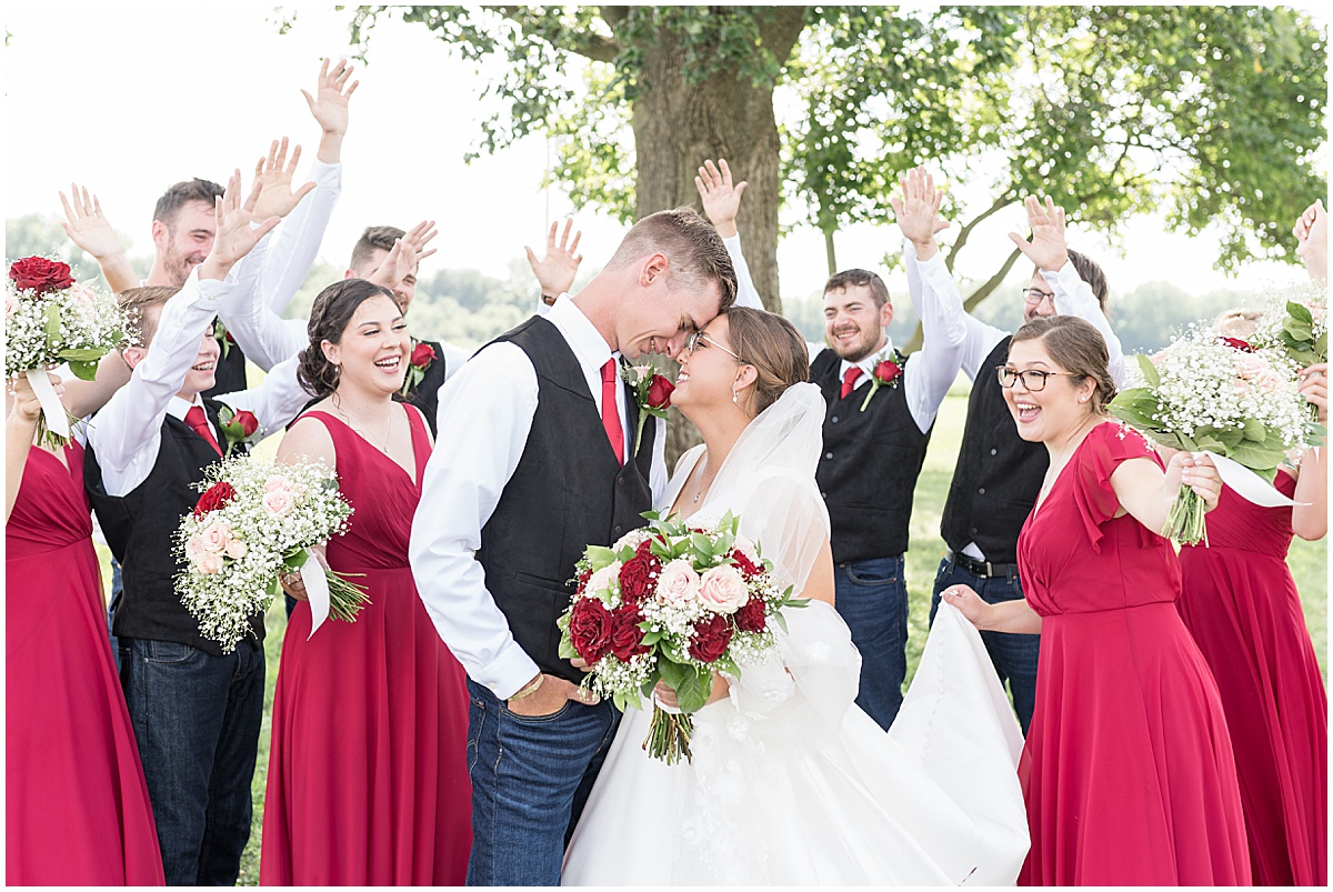 Bridal party cheer for couple at Churchill Farms wedding in Lake Village, Indiana