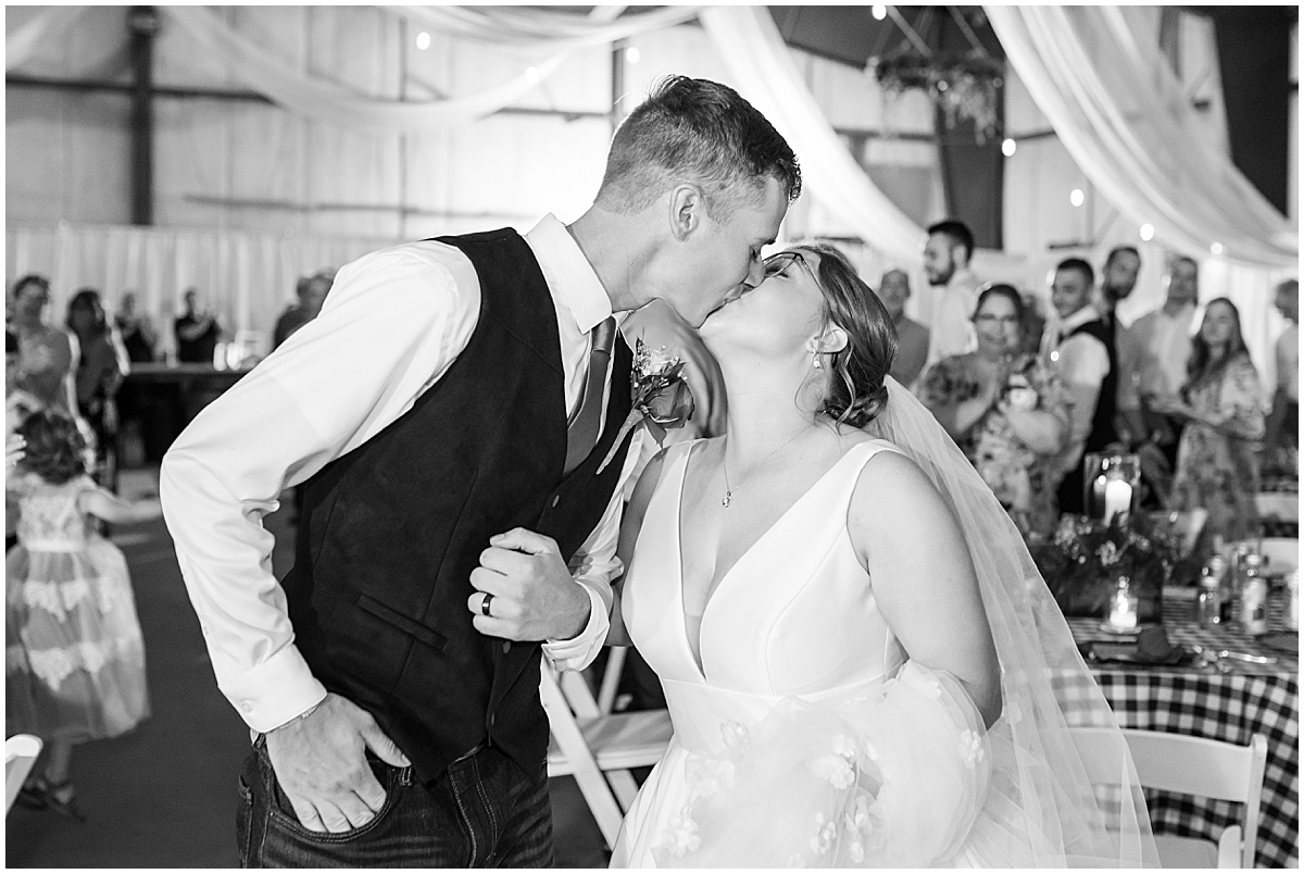 Bride and groom kiss at Churchill Farms wedding in Lake Village, Indiana