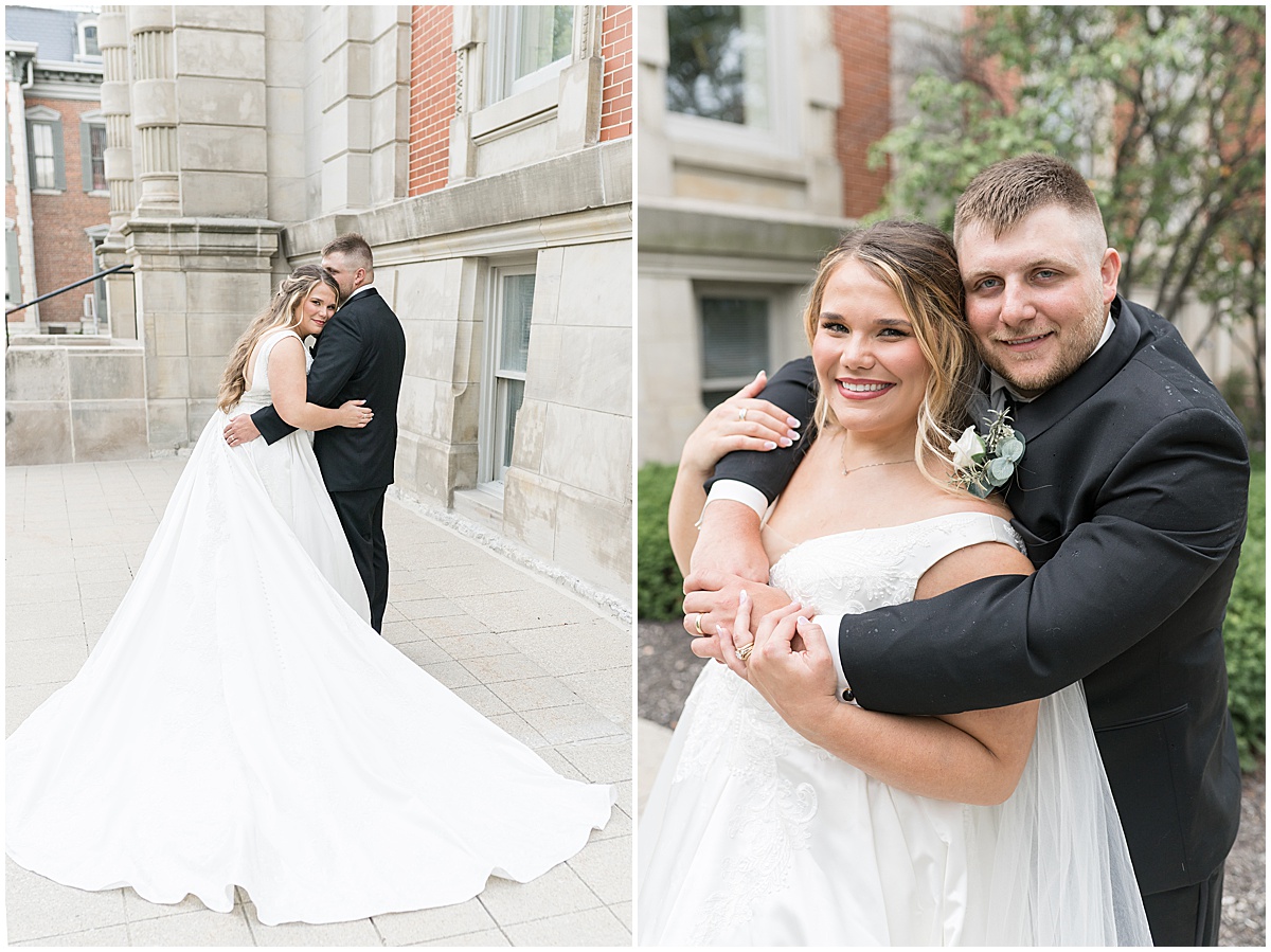 Bride showing full train during wedding photos at Hamilton County Courthouse in downtown Noblesville, Indiana 