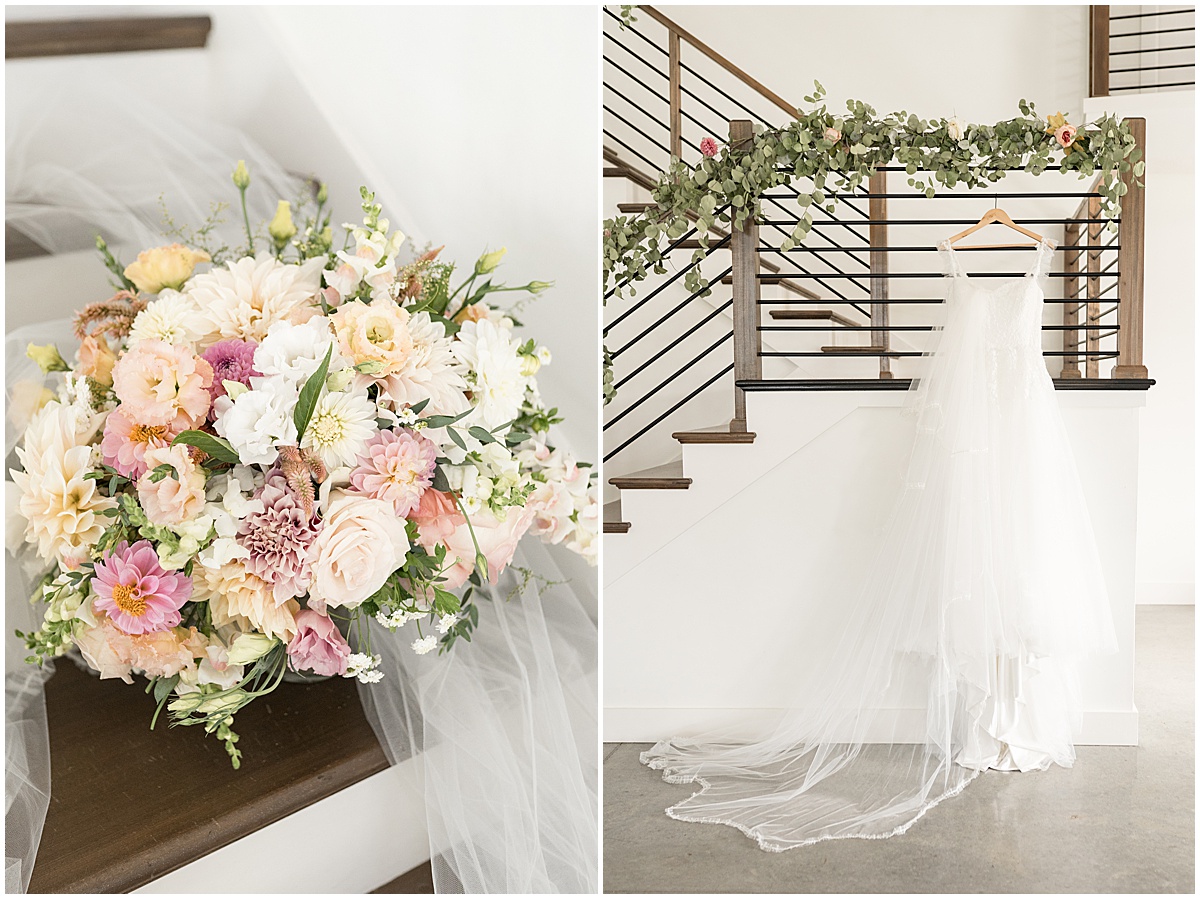 Hanging wedding dress and bouquet on steps for pastel wedding at New Journey Farms in Lafayette, Indiana
