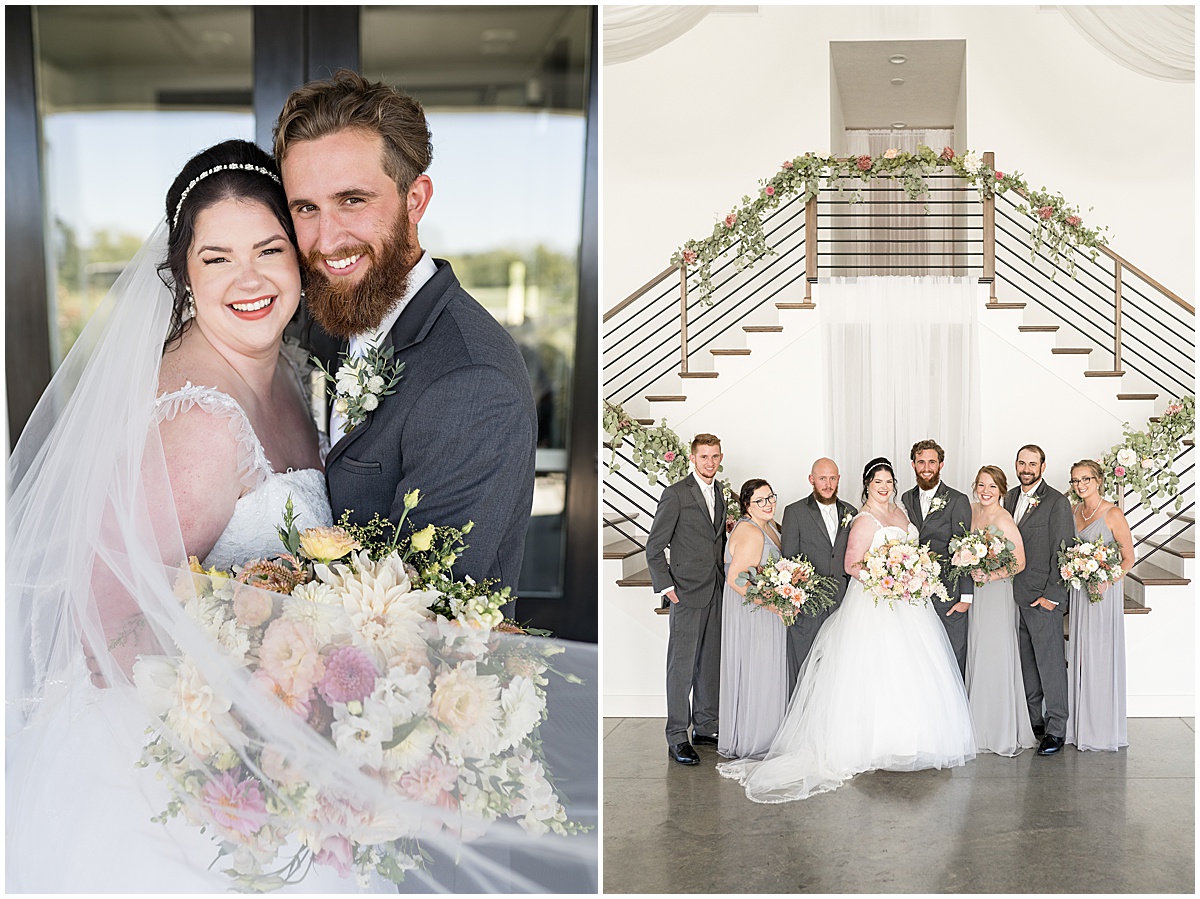 Bridal party in front of grand staircase at pastel wedding at New Journey Farms in Lafayette, Indiana