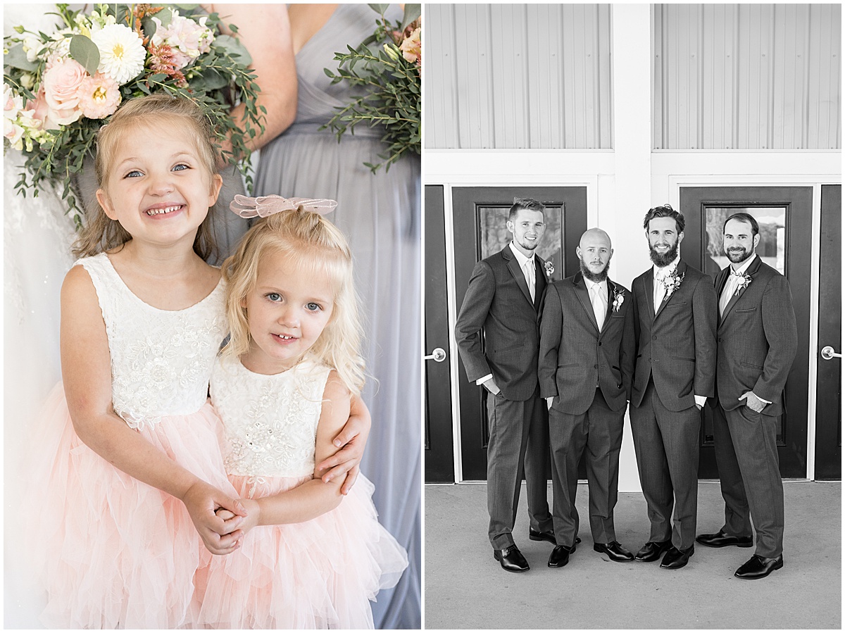 Flower girls hold hands at pastel wedding at New Journey Farms in Lafayette, Indiana