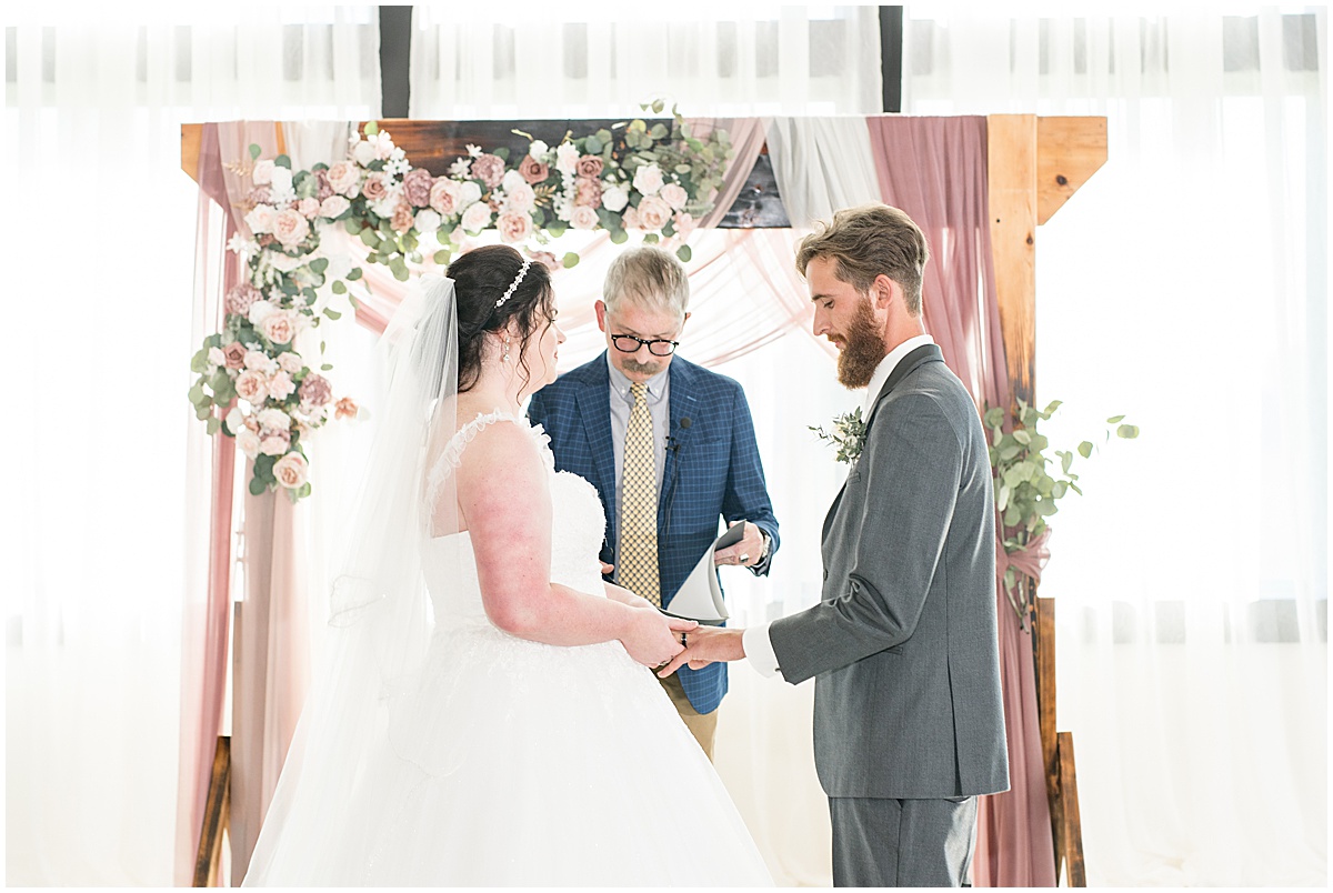 Ceremony of pastel wedding at New Journey Farms in Lafayette, Indiana