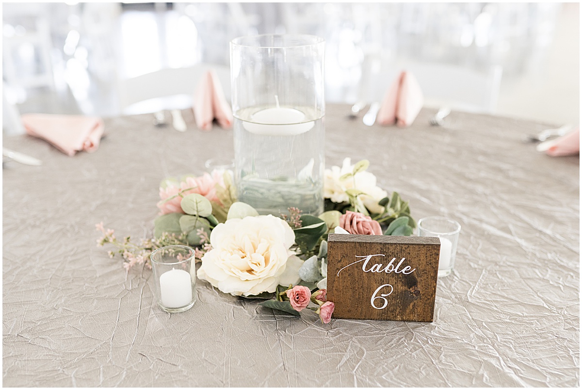 Reception centerpiece for pastel wedding at New Journey Farms in Lafayette, Indiana