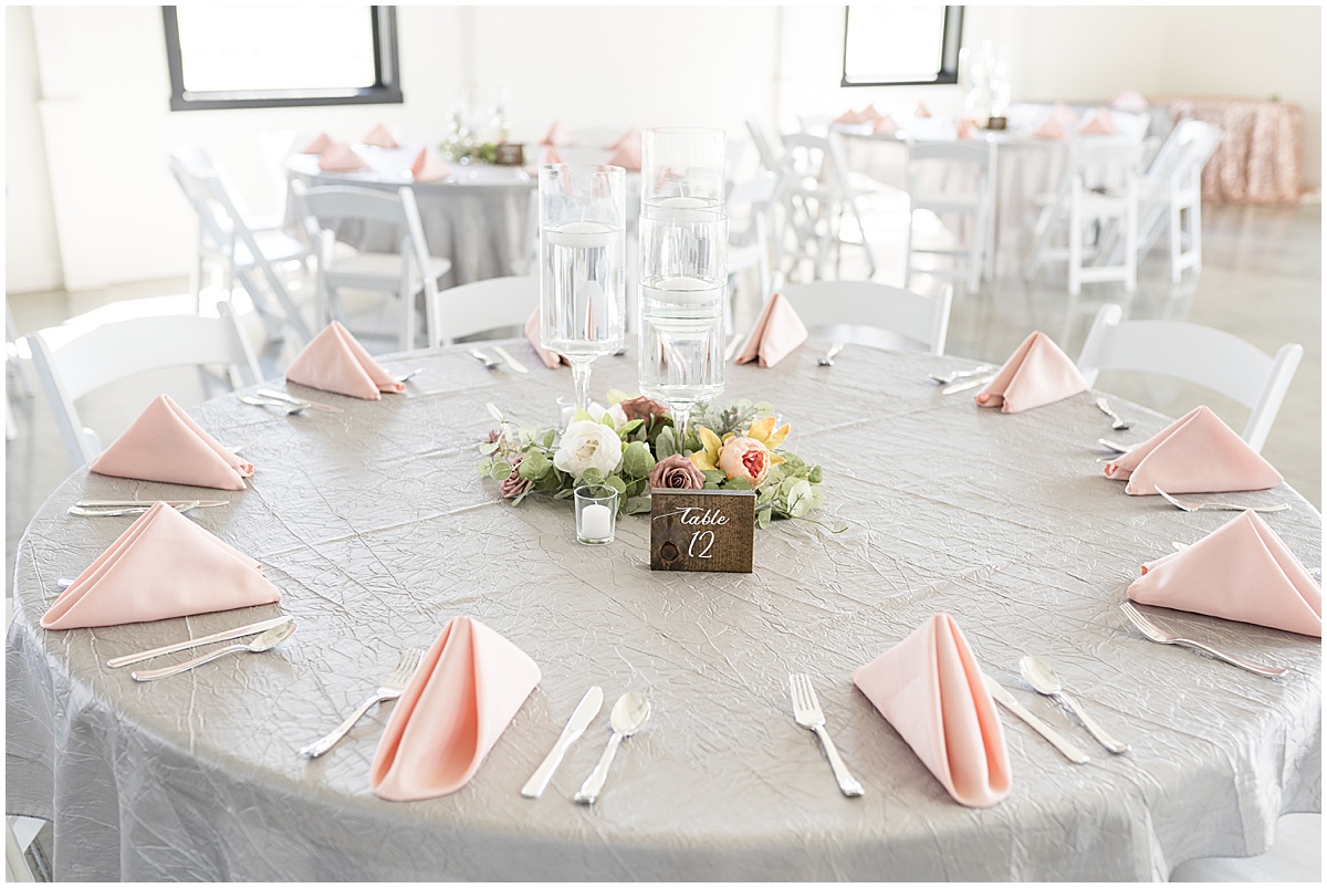 Table settings for pastel wedding at New Journey Farms in Lafayette, Indiana