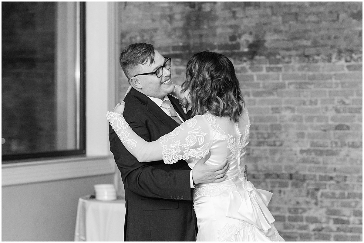 Bride and groom's first dance at fall wedding at The Rat Pak Venue in Downtown Lafayette, Indiana