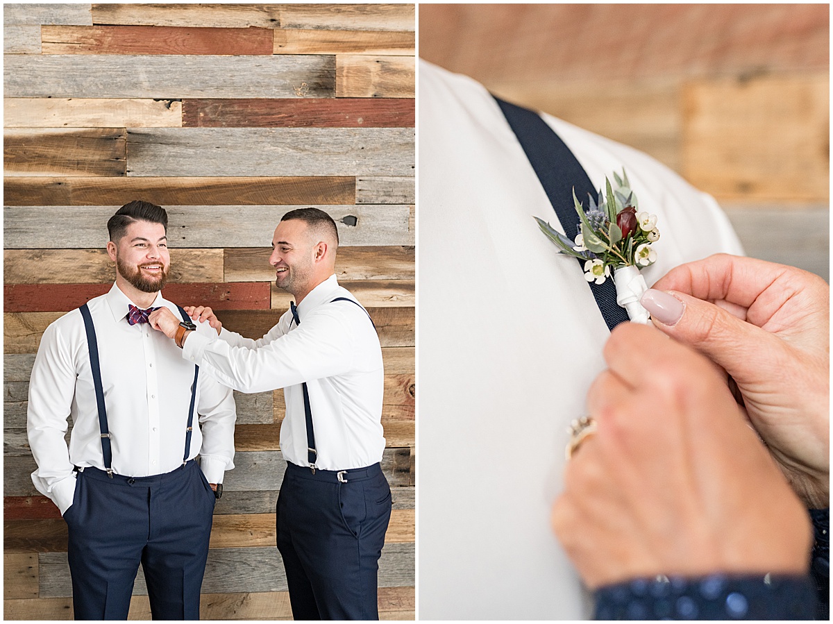Groomsmen helps groom get ready for Finley Creek Vineyards wedding in Zionsville, Indiana