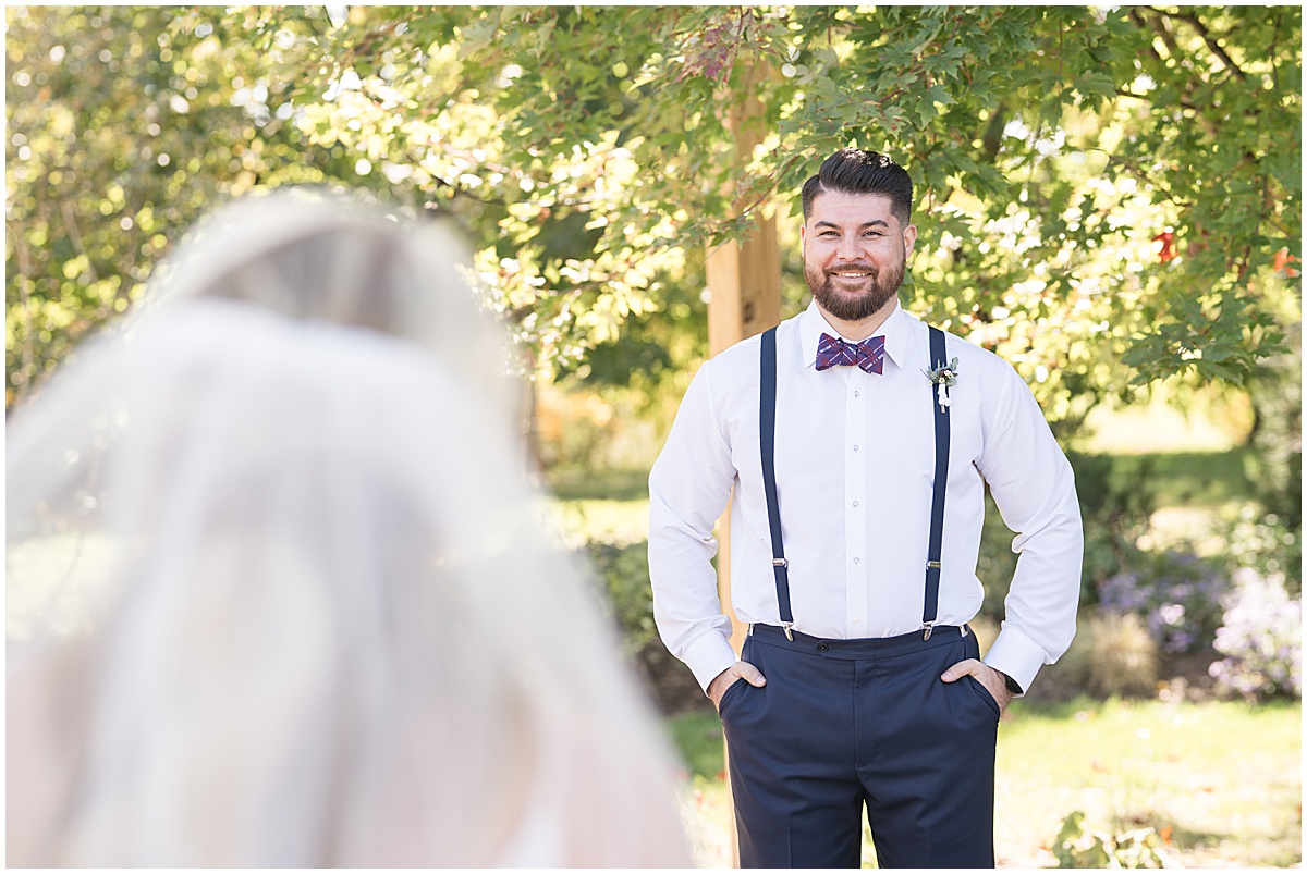 First look reaction at Finley Creek Vineyards wedding in Zionsville, Indiana