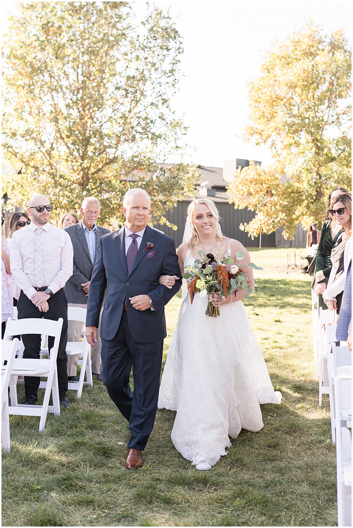 Bride walking down the aisle at Finley Creek Vineyards wedding in Zionsville, Indiana